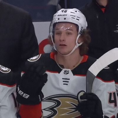 A Hockey Player Wearing A Helmet That Says Bauer GIF