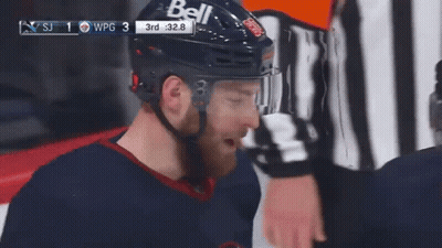 A Hockey Player Wearing A Helmet That Says Bell GIF