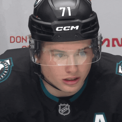 A Hockey Player Wearing A Helmet That Says Ccm On It GIF