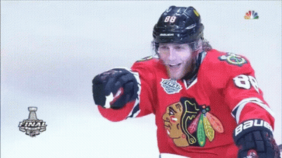 A Hockey Player Wearing A Jersey That Says 88 On It GIF