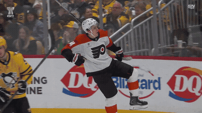 A Hockey Player Wearing A Jersey That Says Flyers Is Skating On The Ice GIF