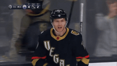 A Hockey Player Wearing A Jersey That Says Vegas GIF