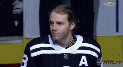 A Hockey Player Wearing A Jersey With The Letter A On The Front GIF
