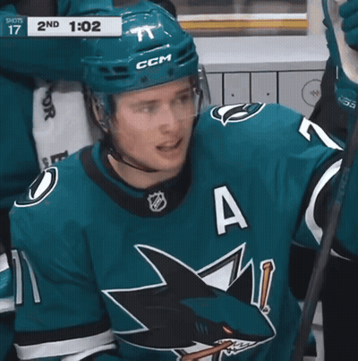 A Hockey Player Wearing A Jersey With The Letter A On The Front GIF