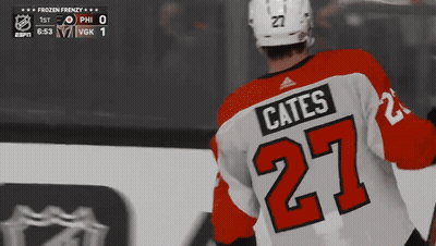 A Hockey Player Wearing A Jersey With The Name Cates On It GIF