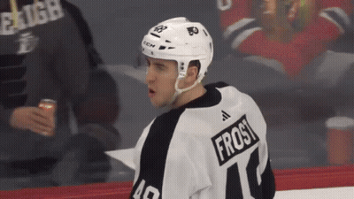 A Hockey Player Wearing A Jersey With The Name Frost On It GIF