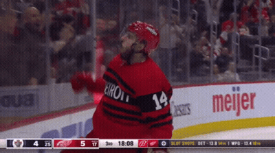 A Hockey Player Wearing A Jersey With The Number 14 On It GIF