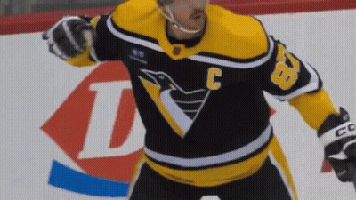 A Hockey Player Wearing A Jersey With The Number 28 On It GIF