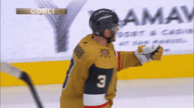 A Hockey Player Wearing A Jersey With The Number 3 GIF