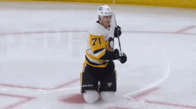 A Hockey Player Wearing A Jersey With The Number 4 On It GIF