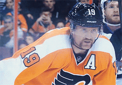 A Hockey Player Wearing A Jersey With The Number 4 On It GIF