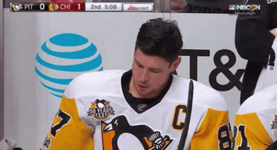 A Hockey Player Wearing A Jersey With The Number 7 On It GIF