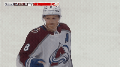 A Hockey Player Wearing A Jersey With The Number 8 GIF