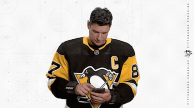 A Hockey Player Wearing A Jersey With The Number 8 On It GIF