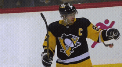 A Hockey Player Wearing A Jersey With The Number C On It GIF