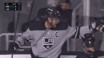 A Hockey Player Wearing A La Jersey Celebrates His Goal GIF