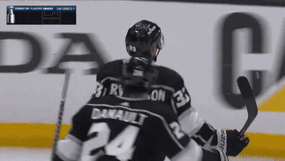 A Hockey Player Wearing A Number 24 Jersey GIF