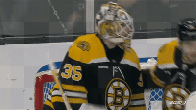 A Hockey Player Wearing A Number 35 Jersey GIF