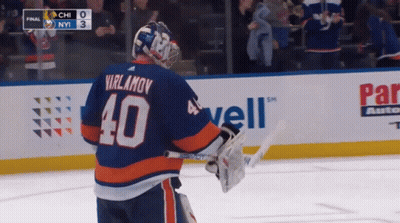 A Hockey Player Wearing A Number 40 Jersey GIF
