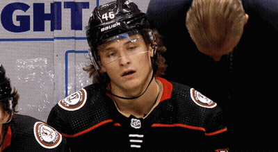 A Hockey Player Wearing A Number 46 Helmet GIF