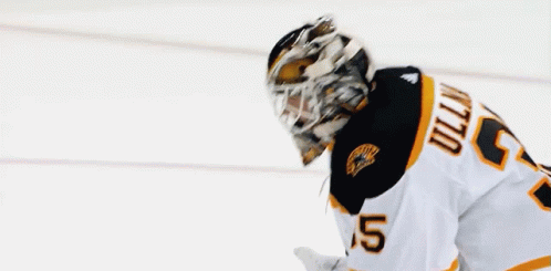 A Hockey Player Wearing A Number 5 Jersey GIF