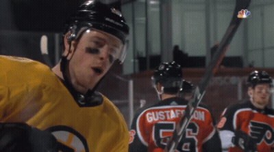 A Hockey Player Wearing A Number 56 Jersey GIF