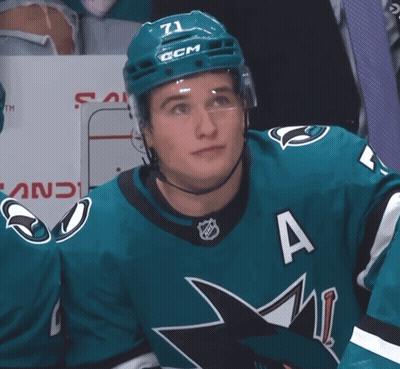 A Hockey Player Wearing A Number 71 Jersey GIF