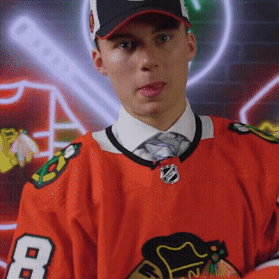 A Hockey Player Wearing A Number 8 Jersey GIF