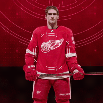 A Hockey Player Wearing A Red Bauer Jersey GIF