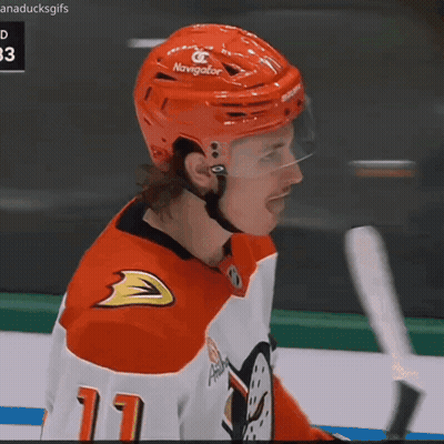 A Hockey Player Wearing A Red Helmet That Says Navigator GIF