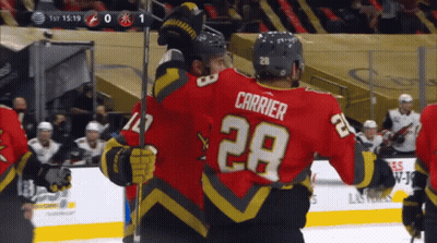A Hockey Player Wearing A Red Jersey With The Number 29 On It GIF