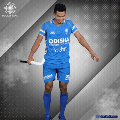 A Hockey Player Wearing An Odisha Jersey Holds A Stick GIF