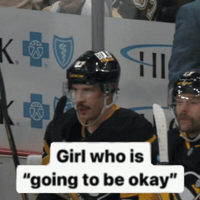 A Hockey Player With A Sign That Says Girl Who Is Going To Be Okay GIF