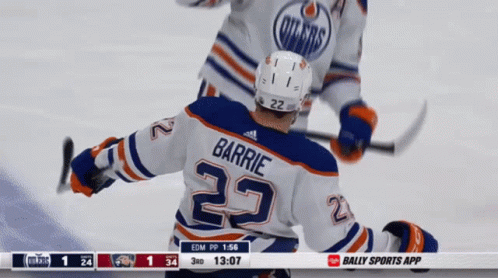 A Hockey Player With The Name Barrie On The Back Of Their Jersey GIF