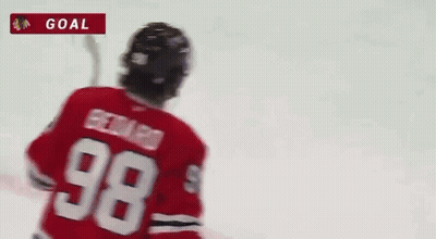 A Hockey Player With The Name Bedard On His Jersey GIF