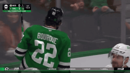 A Hockey Player With The Name Bourque On His Back GIF