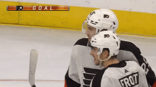 A Hockey Player With The Name Frost On The Back Of His Shirt GIF