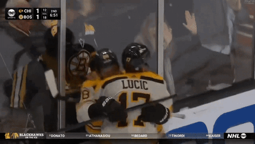 A Hockey Player With The Name Lucic On His Jersey GIF