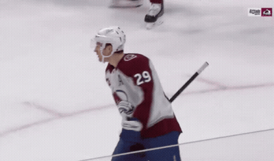 A Hockey Player With The Name Mackinnon On His Jersey GIF