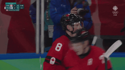 A Hockey Player With The Name Mcdavid On The Back Of His Shirt GIF