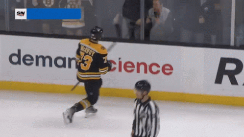 A Hockey Player With The Name Mcdouy On His Jersey GIF