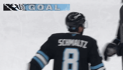 A Hockey Player With The Name Schmidt On His Back GIF