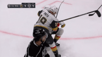 A Hockey Player With The Name Smith On His Back GIF
