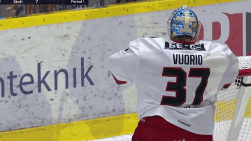 A Hockey Player With The Name Vuorio On The Back Of His Shirt GIF