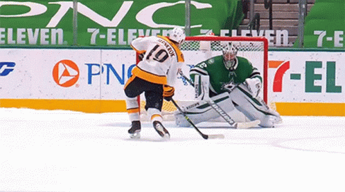 A Hockey Player With The Number 10 On The Back Of His Shirt GIF