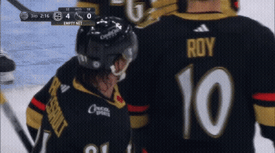 A Hockey Player With The Number 10 On Their Jersey GIF