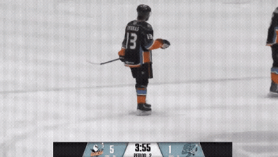 A Hockey Player With The Number 13 On His Jersey Is Standing On The Ice GIF