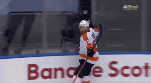 A Hockey Player With The Number 13 On His Shirt GIF