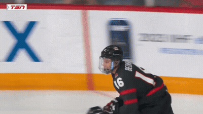 A Hockey Player With The Number 16 On His Back GIF