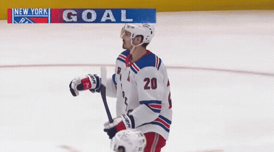 A Hockey Player With The Number 20 On Their Jersey GIF